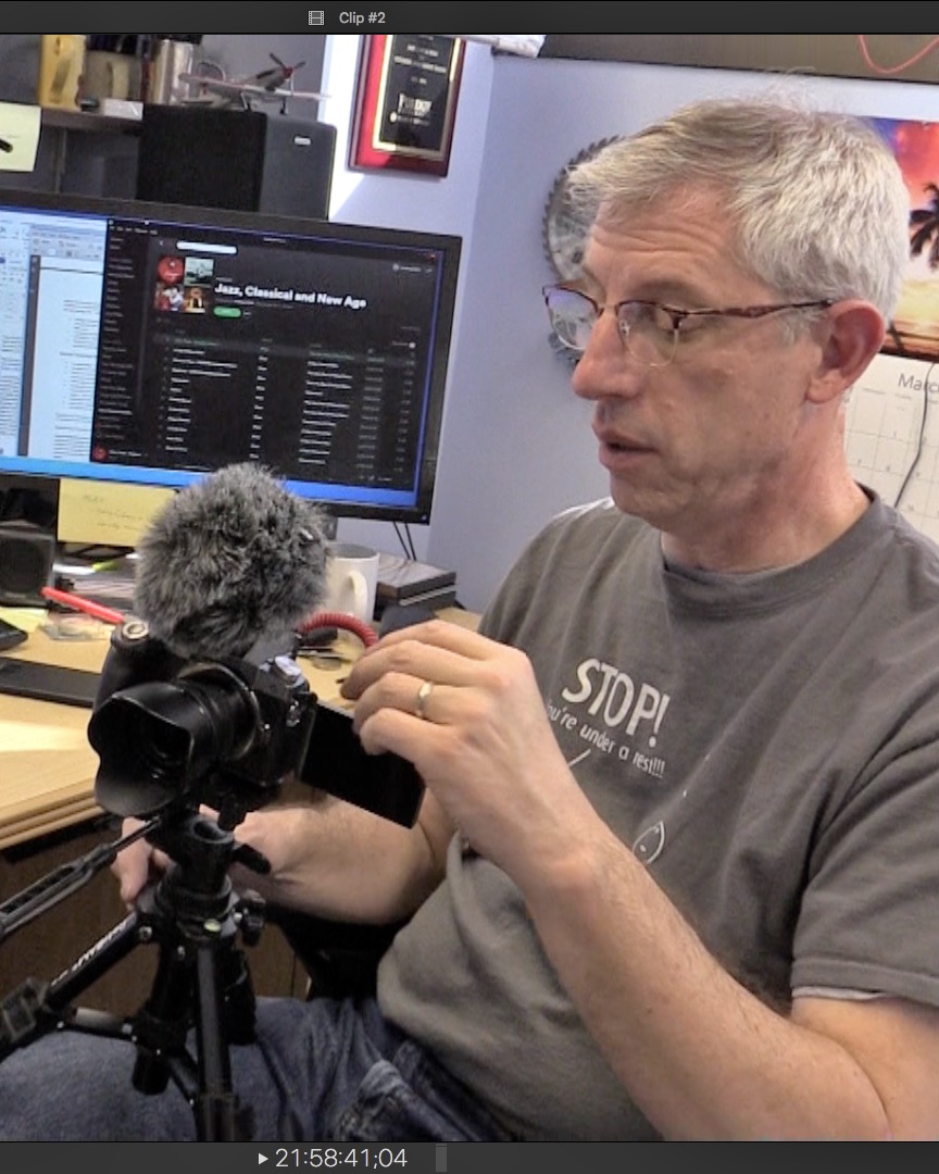 Mark French prepares his camera for a video recording session