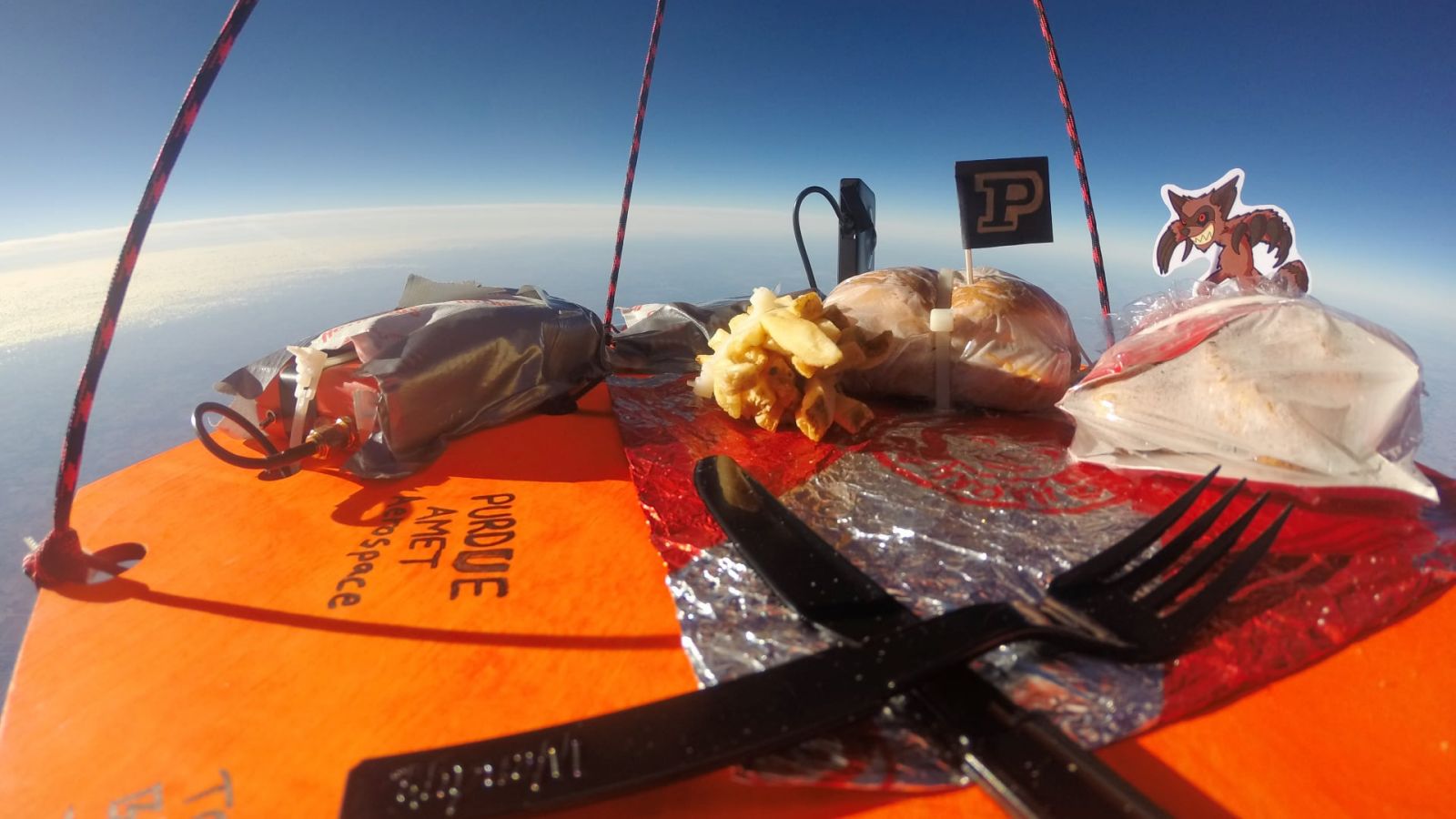 Students in Purdue AMET (Association for Mechanical and Electrical Technologists) lofted a high-altitude weather balloon with a Wendy's Baconator and French fries to 95,000 feet. This photo is from 60,000 feet.