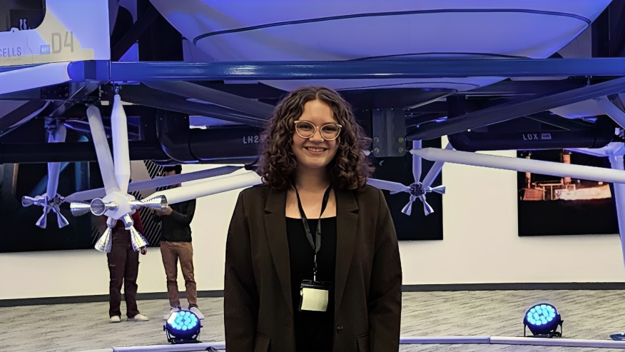 Allison Boyd pictured with a Blue Origin aerospace craft. (Photo provided)