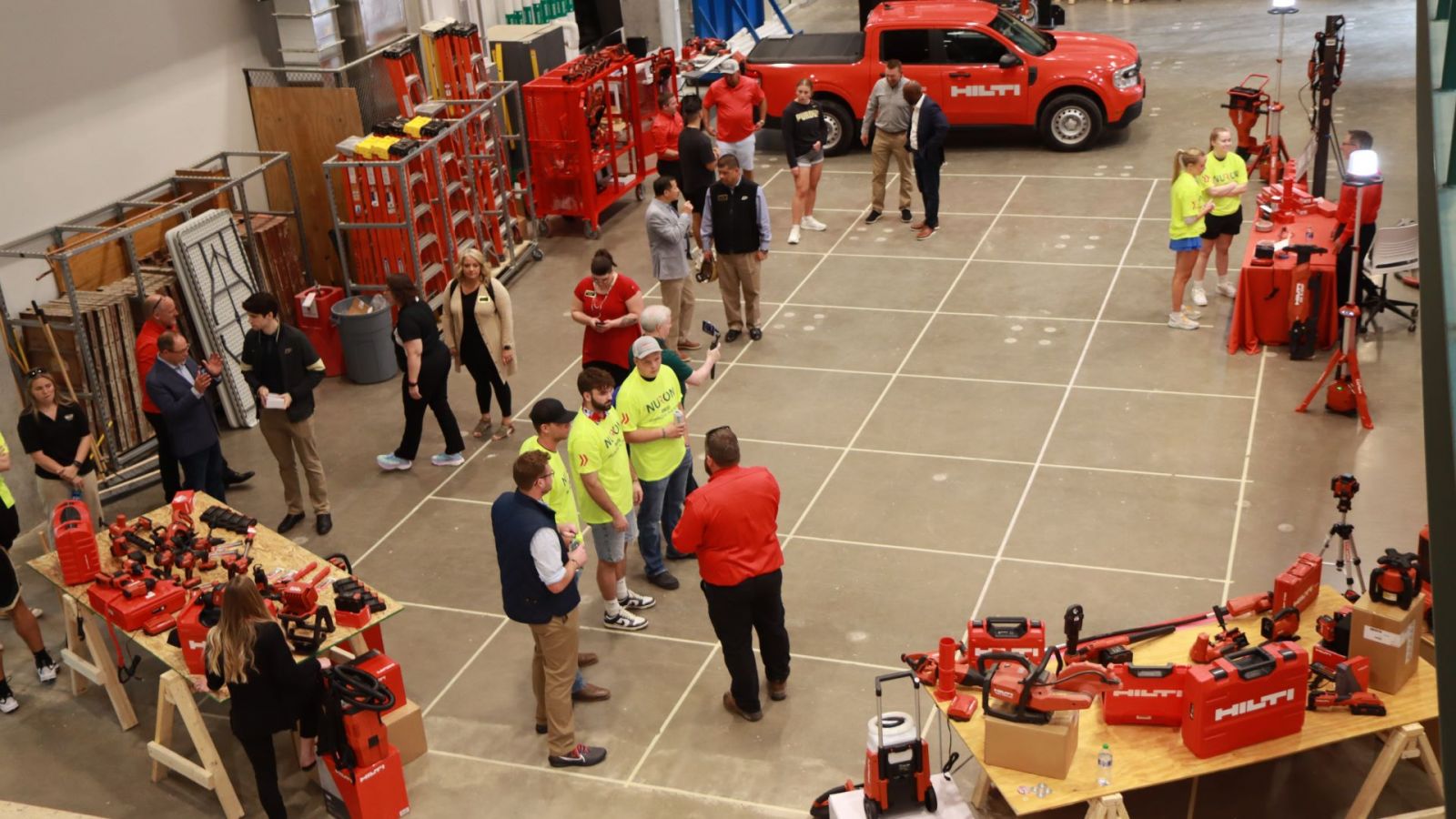 Attendees at the Hilti event gather in Dudley Hall's construction lab. (Purdue University photo/Zach Rodimel)