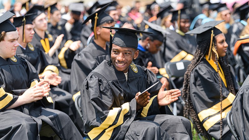 Purdue Polytechnic High School graduates at their 2021 commencement ceremony. This ceremony marked the first time the network graduated students from its PPHS Schweitzer Center at Englewood, North and South Bend campuses. (Purdue University photo/Rebecca McElhoe)